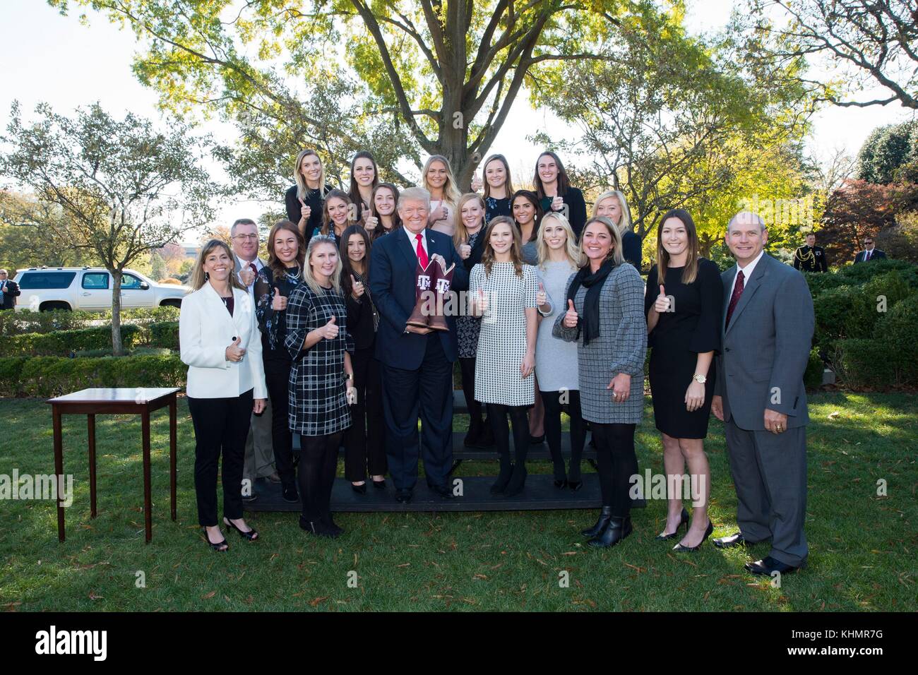 Washington DC, USA. 17th November, 2017. U.S. President Donald Trump poses with the Texas AM University Women's Equestrian NCAA National Championship Team at the White House November 17, 2017 in Washington, D.C. Credit: Planetpix/Alamy Live News Stock Photo