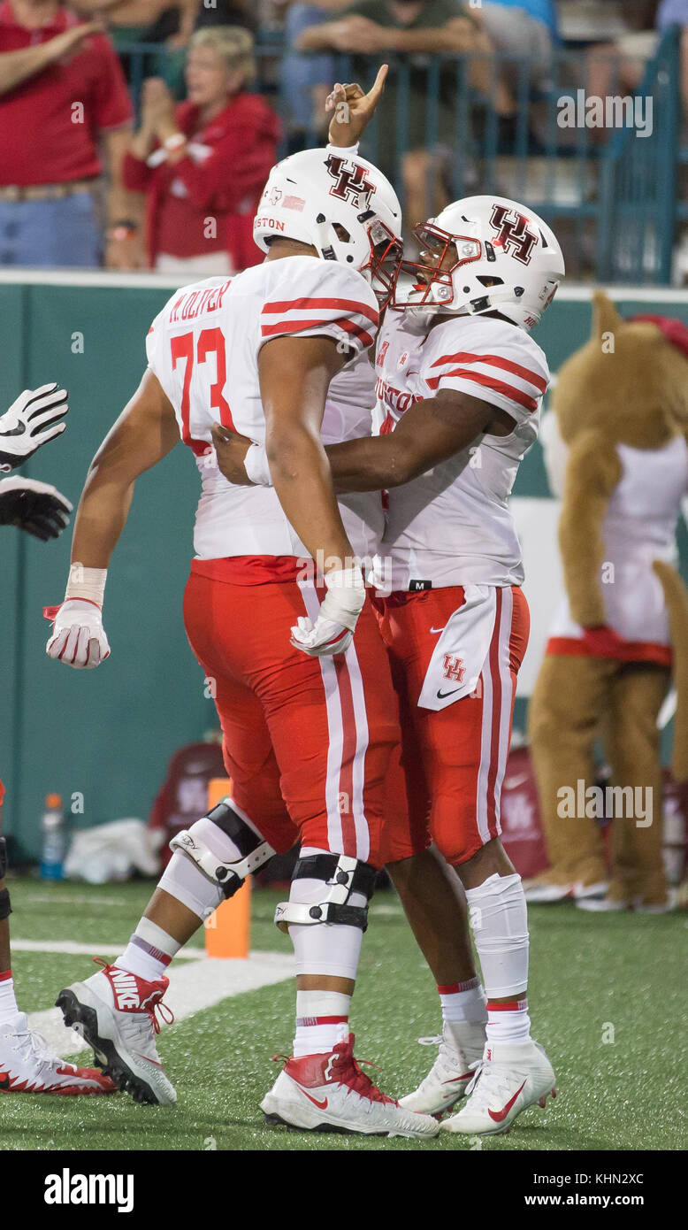 New Orleans, LA, USA. 18th Nov, 2017. Houston's D'Eric King #4 embraces a team mate after scoring a TD during the NCAA football game between the Tulane Green Wave and the Houston Cougars at Yulman Stadium in New Orleans, LA. Kyle Okita/CSM/Alamy Live News Stock Photo