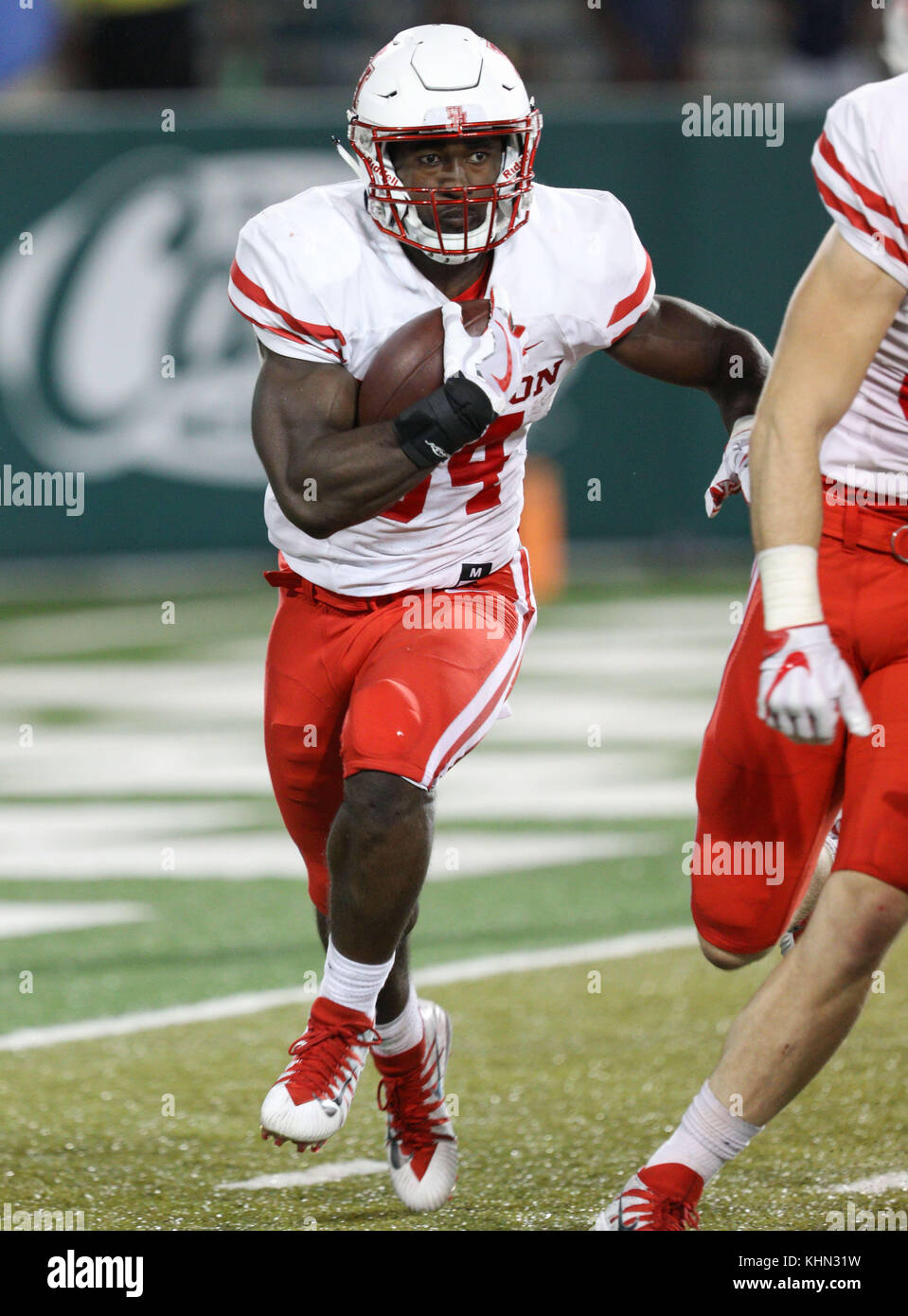 New Orleans, LA, USA. 18th Nov, 2017. Houston's Mulbah Car #34 carries the ball during the NCAA football game between the Tulane Green Wave and the Houston Cougars at Yulman Stadium in New Orleans, LA. Kyle Okita/CSM/Alamy Live News Stock Photo