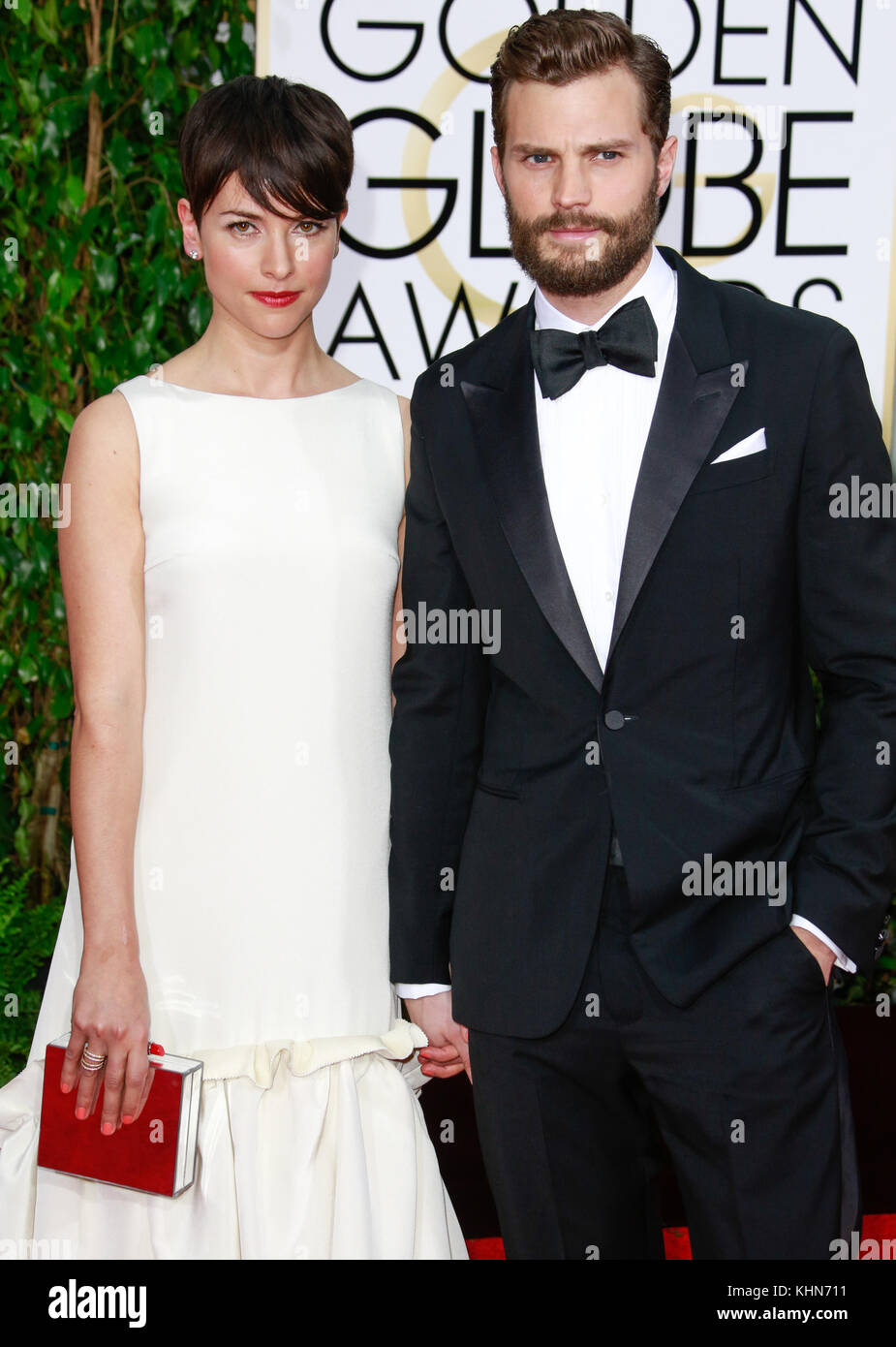 BEVERLY HILLS, CA - January 11: Jamie Dornan and Amelia Warner at Golden  Globes 2015 held at Beverly Hilton in Beverly Hills, California on January  11, 2015. Photo Credit: mpi500/MediaPunch Stock Photo - Alamy