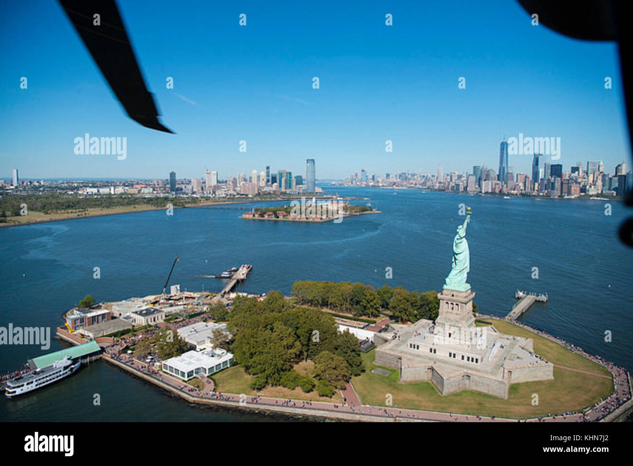 A UH-60 Blackhawk circles the Statue of Liberty during an orientation flight just outside of New York City, N.Y. Oct. 2, 2017. Stock Photo
