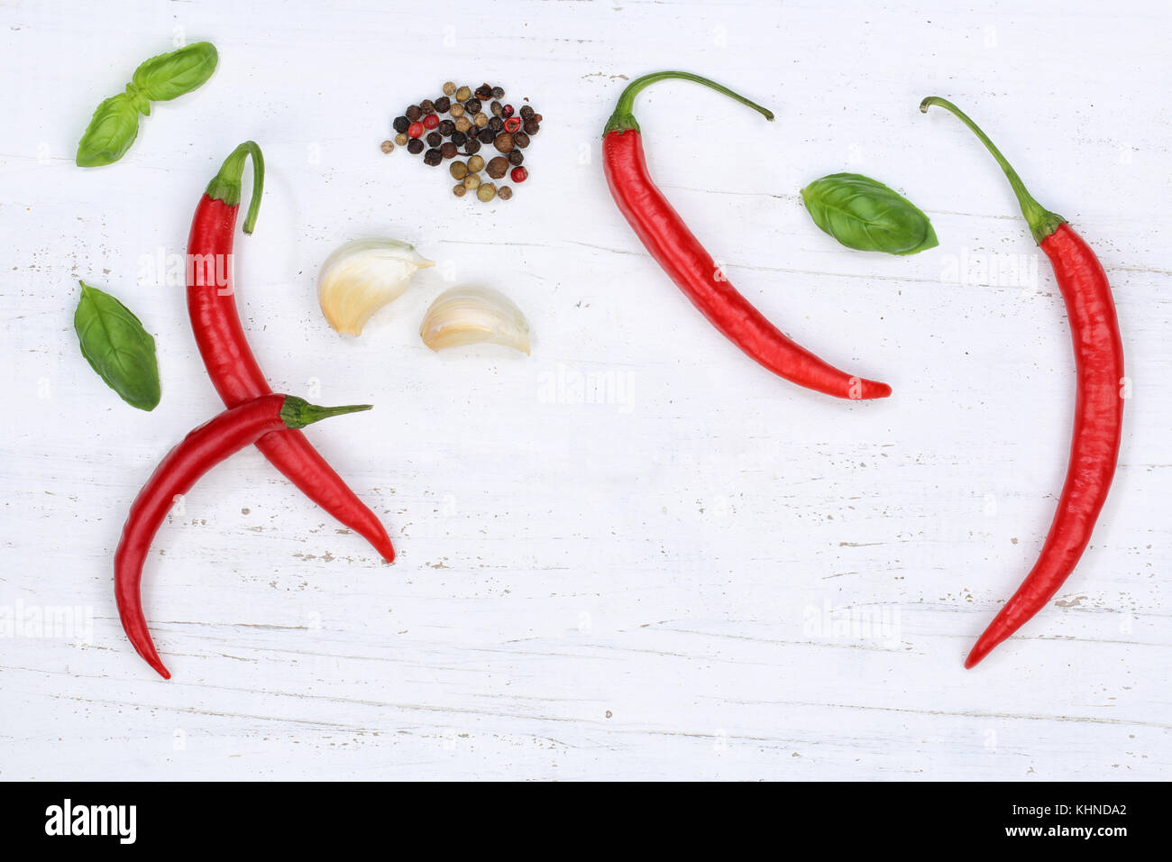 Red hot chili peppers chilli cooking ingredients background top view above Stock Photo