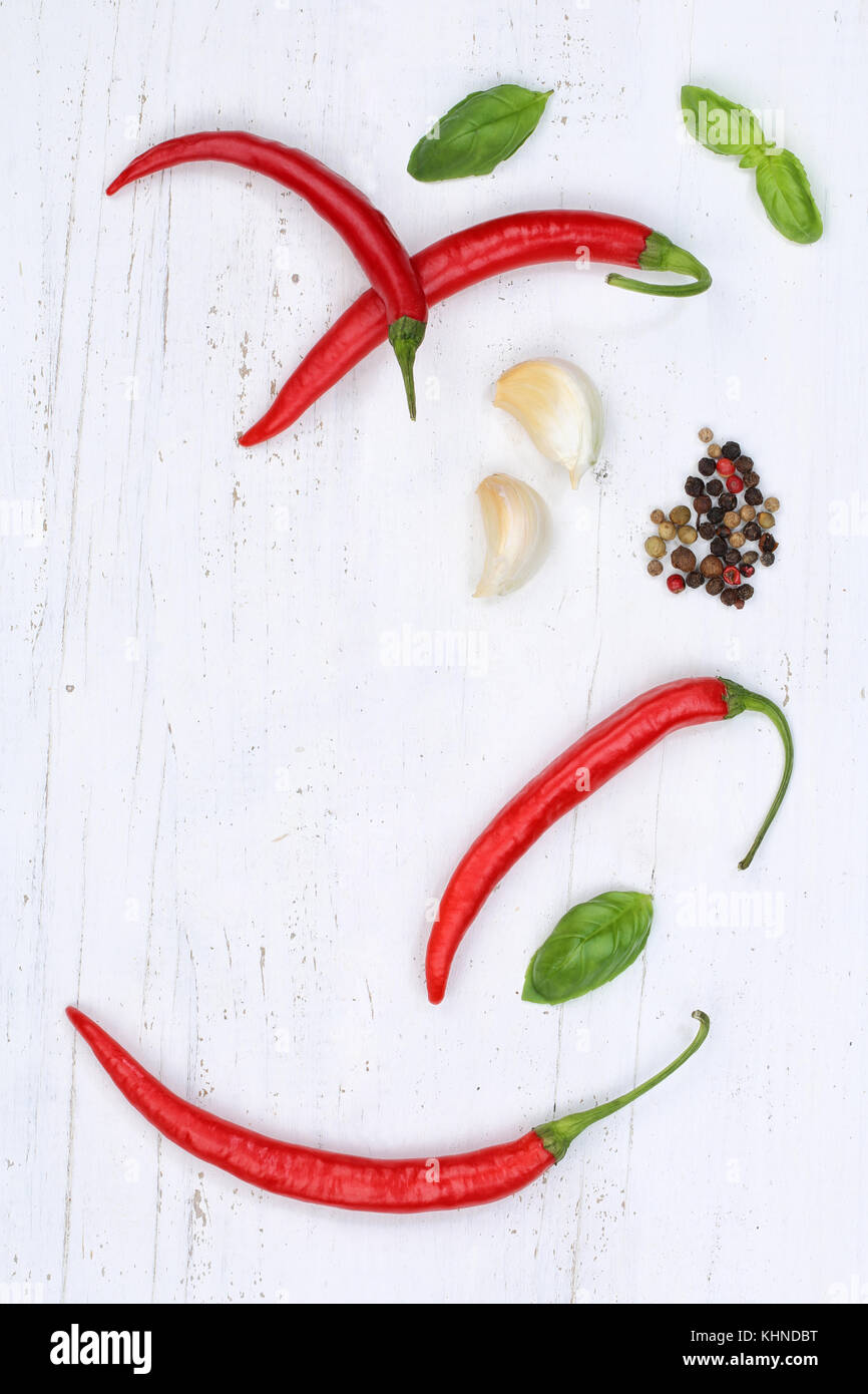 Red hot chili peppers chilli cooking ingredients portrait format background top view above Stock Photo