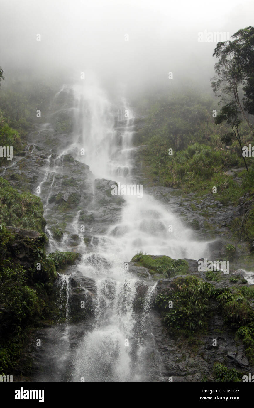 Waterfall in mist in Kinabalu national park in Sabah, Borneo, Malaysia Stock Photo
