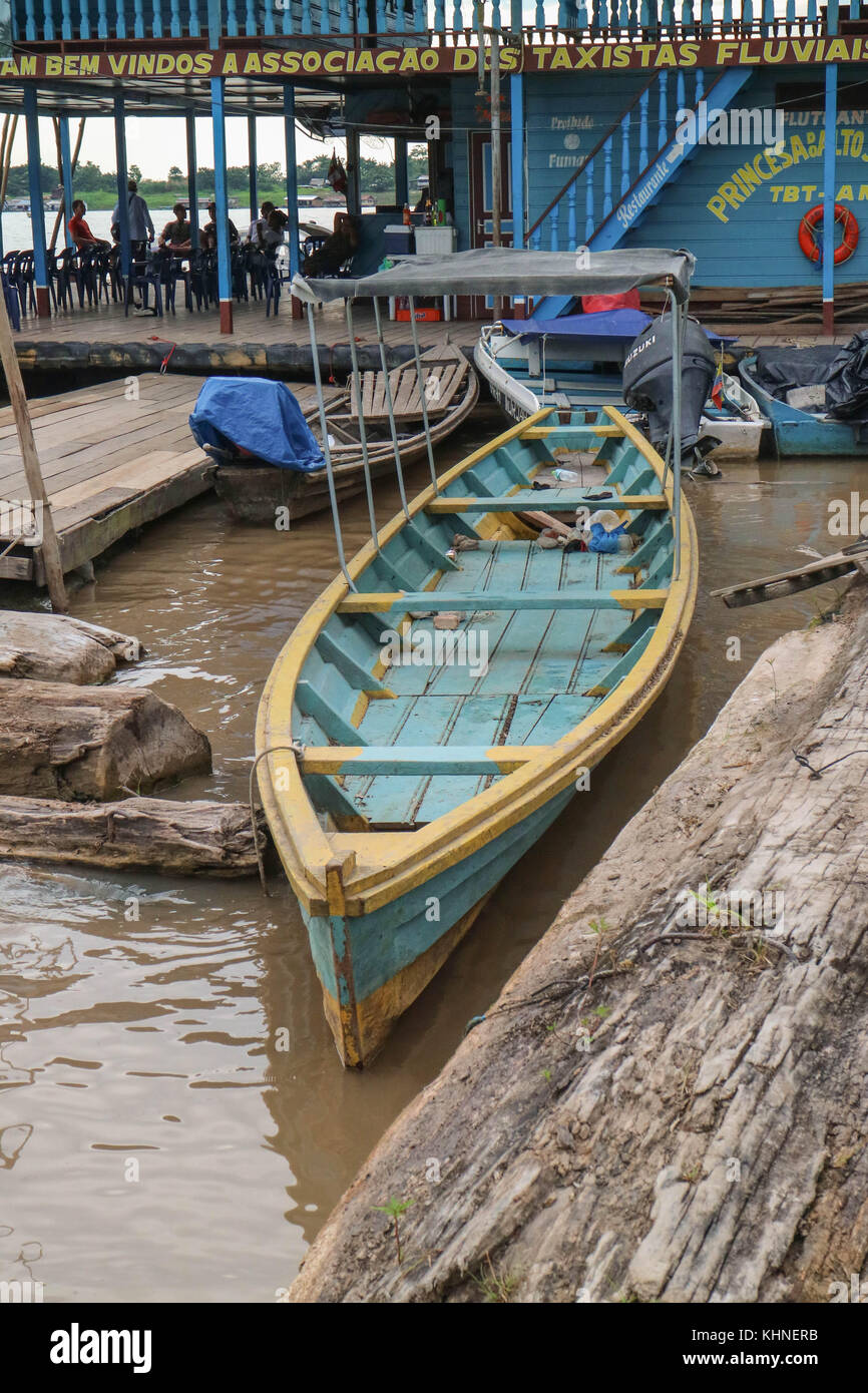 Wooden canoe in river port at Amazonas rain forest Stock Photo Alamy