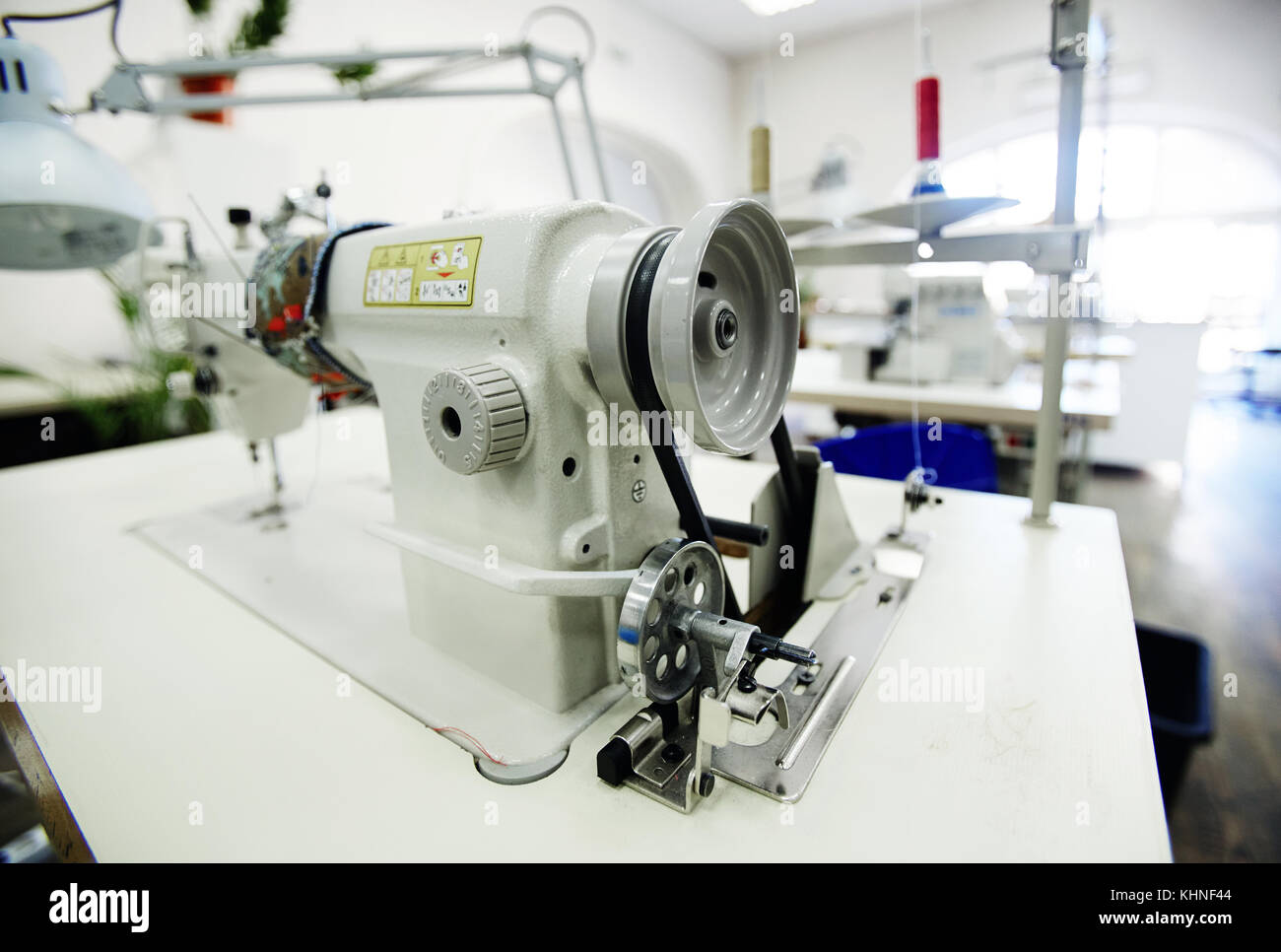 Contemporary semiautomatic sewingmachine in tailor Stock Photo Alamy