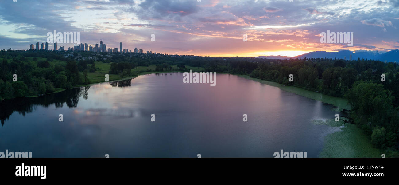 Aerial View of Deer Lake Park with Metrotown City Skyline in the