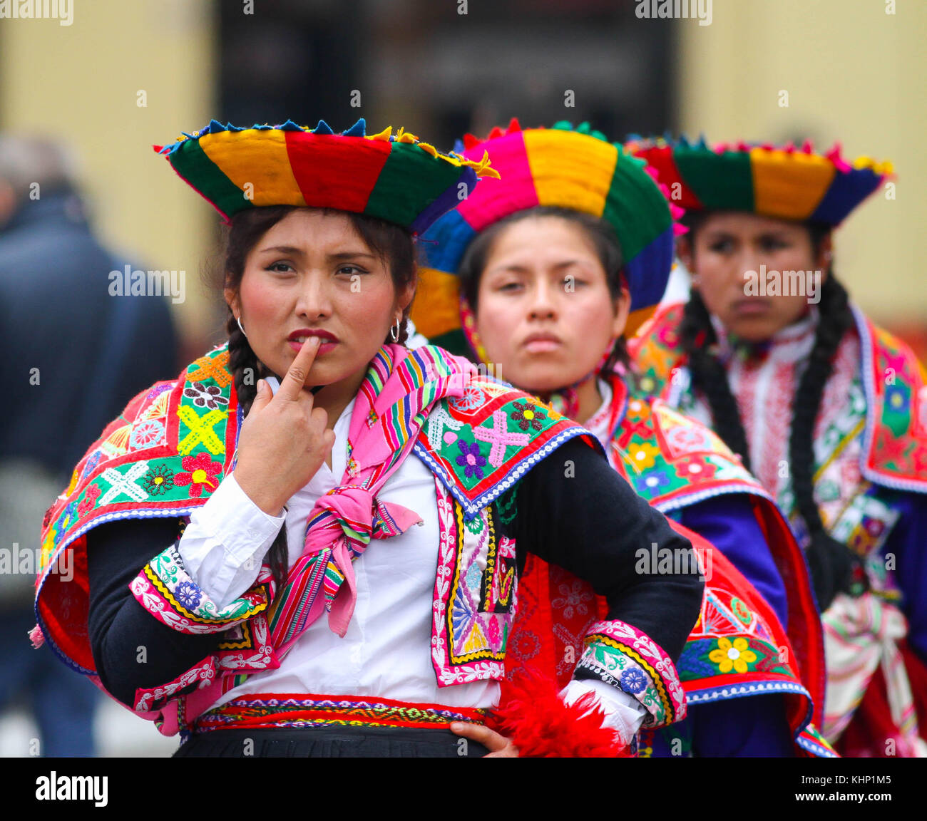 Women in costume at a street carnival in Lima, Peru Stock Photo