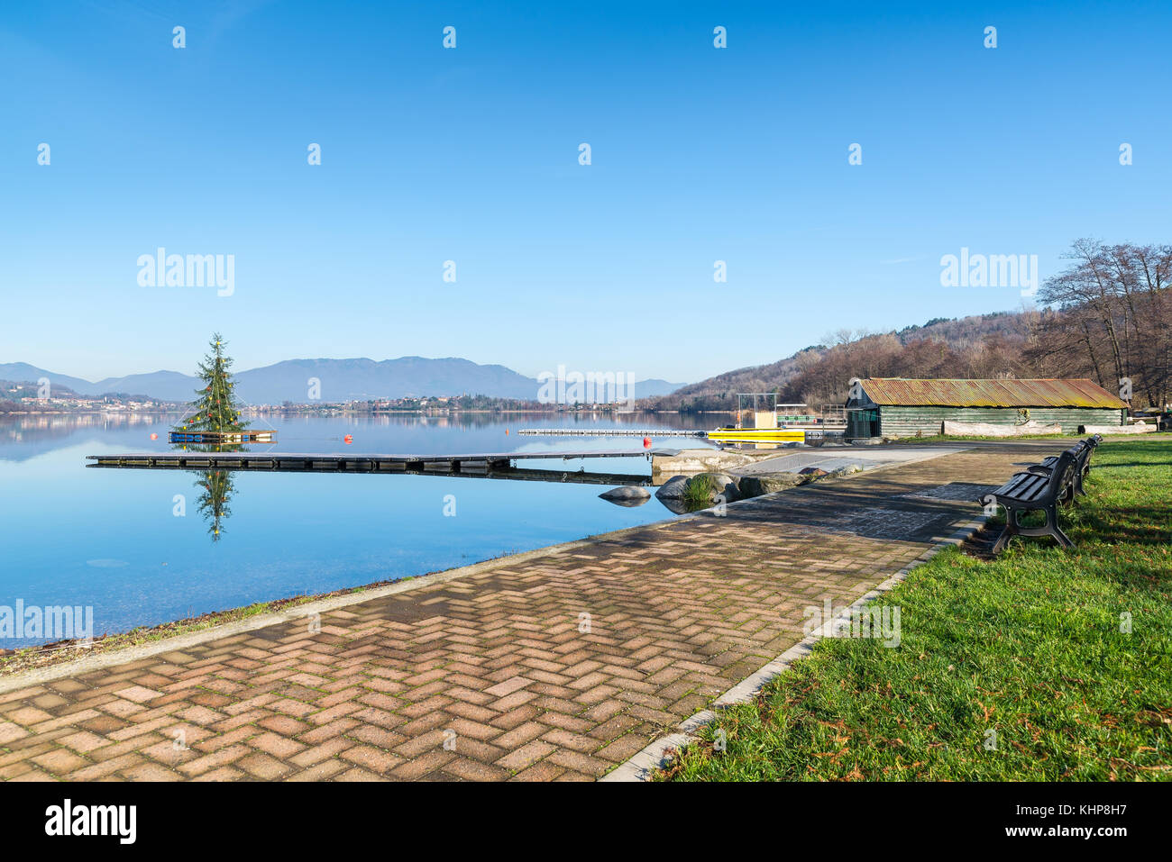 Corgeno town, Lake Comabbio, Italy. Panorama from the public park on the lakefront of Corgeno in winter. View towards Varano Borghi and Ternate Stock Photo