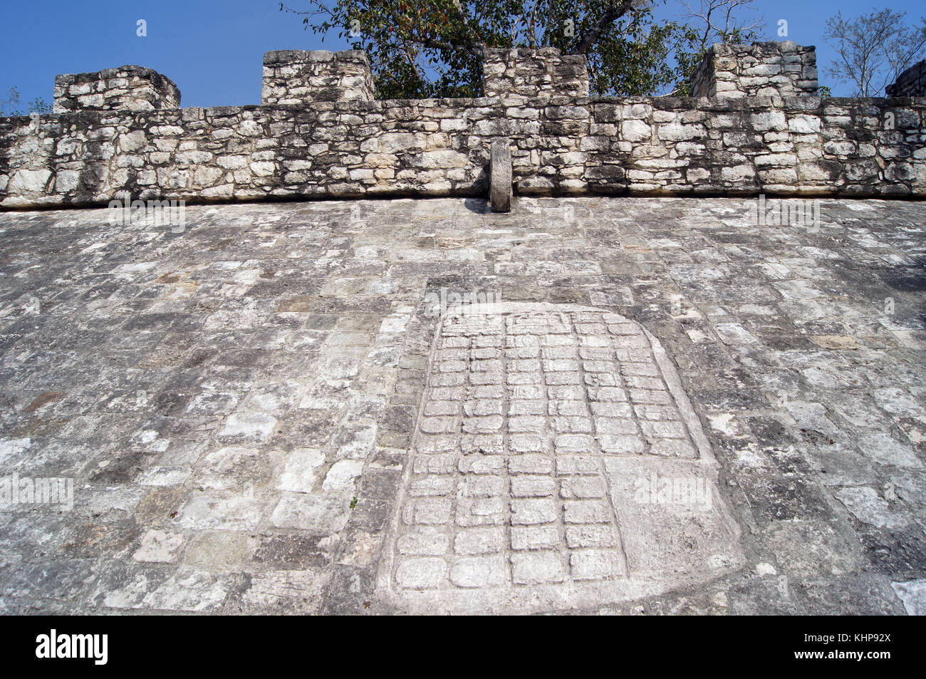 Wall with mayan letters in Coba, Mexico Stock Photo