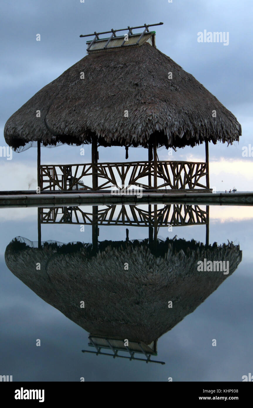 Smal hut near water in outdoor pool in Livingston, Guatemala Stock Photo