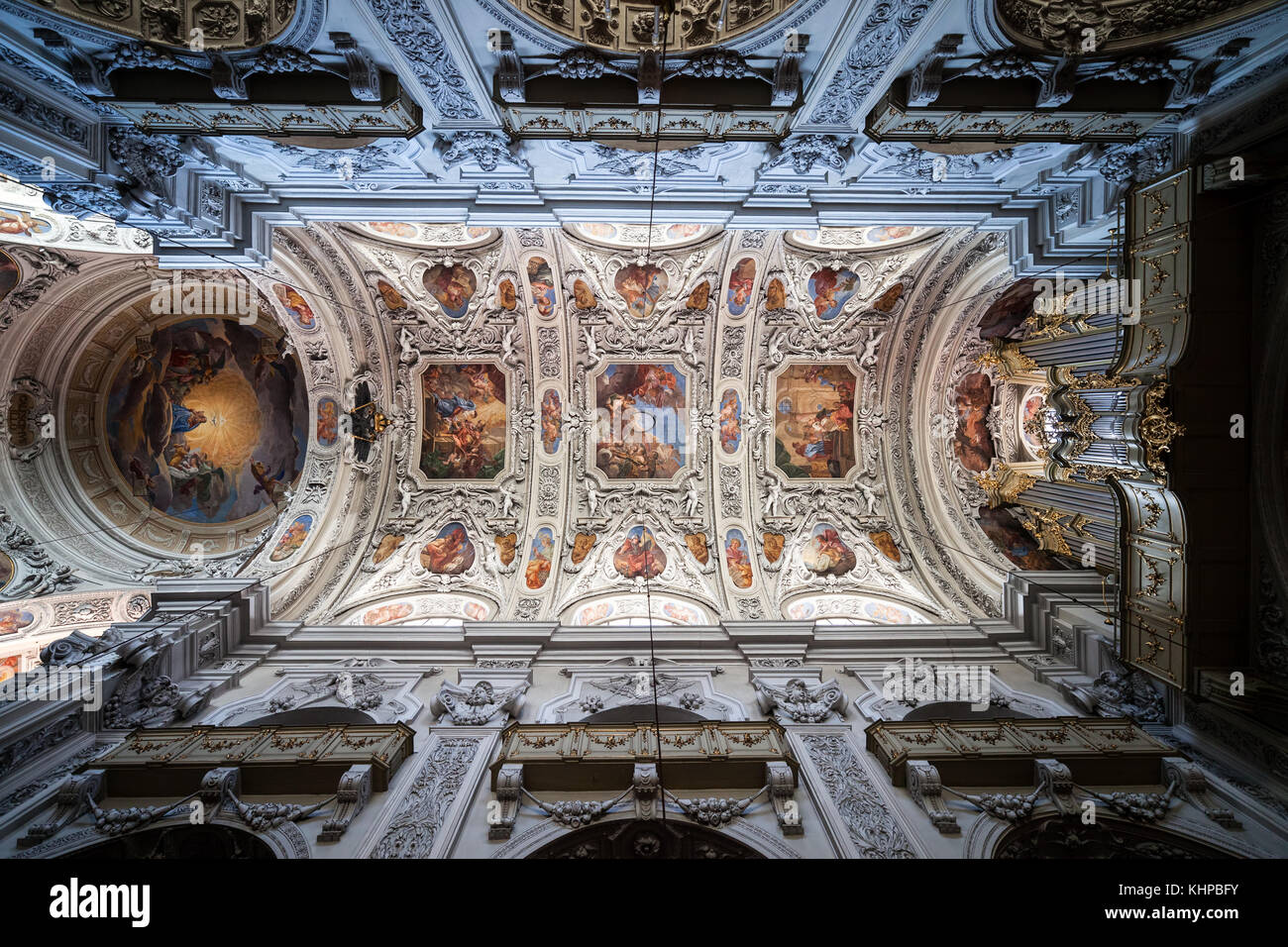 Dominican Church (Dominikanerkirche) interior in Vienna city, Austria, barrel vault ceiling with stucco and frescos, elaborate ornamentation Stock Photo