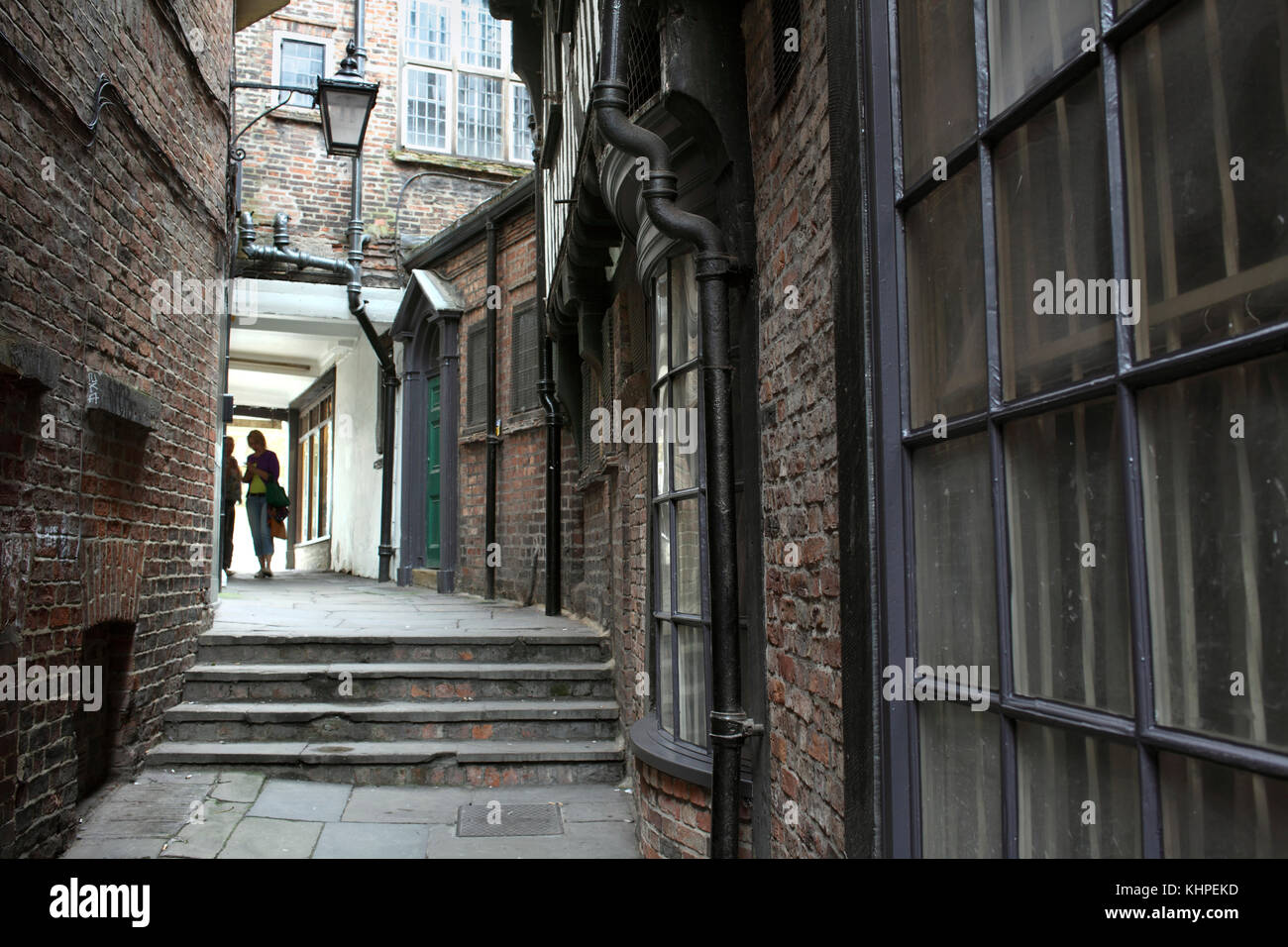 Lady Peckett's Yard, one of many narrow back alleys that thread their way through the city centre of York. Stock Photo