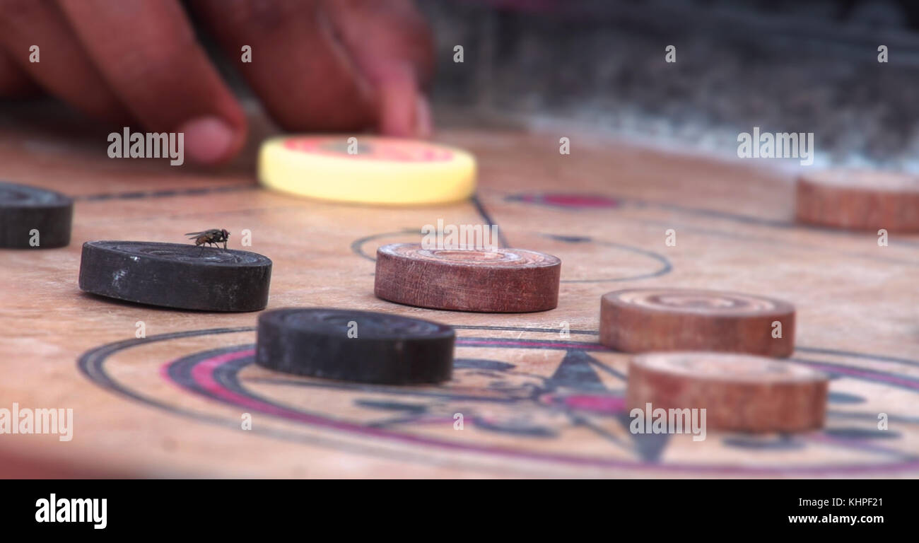 Karrom game hi-res stock photography and images - Alamy