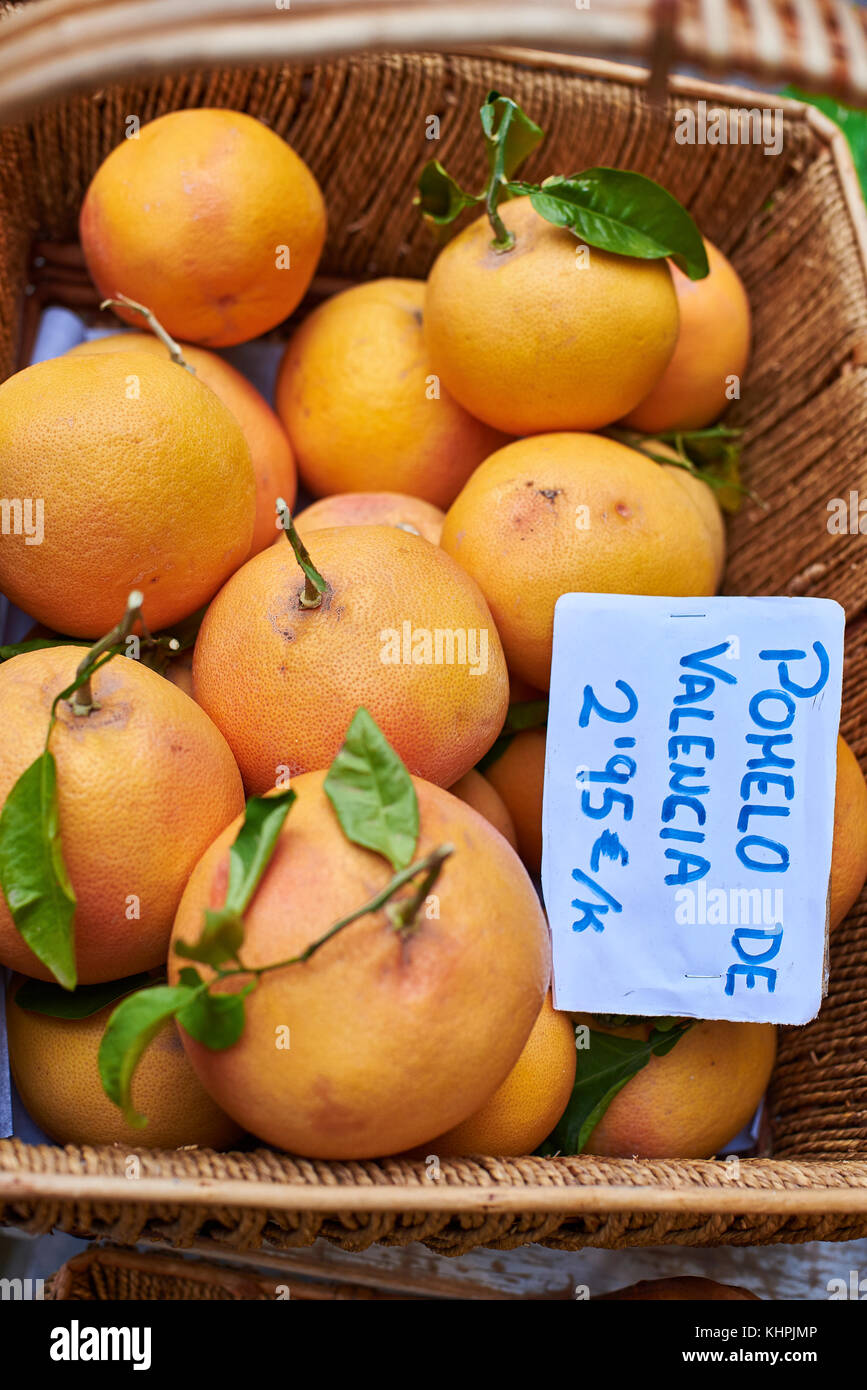 Ecological grapefruit from Valencia, Spain, in a wicker basket of a