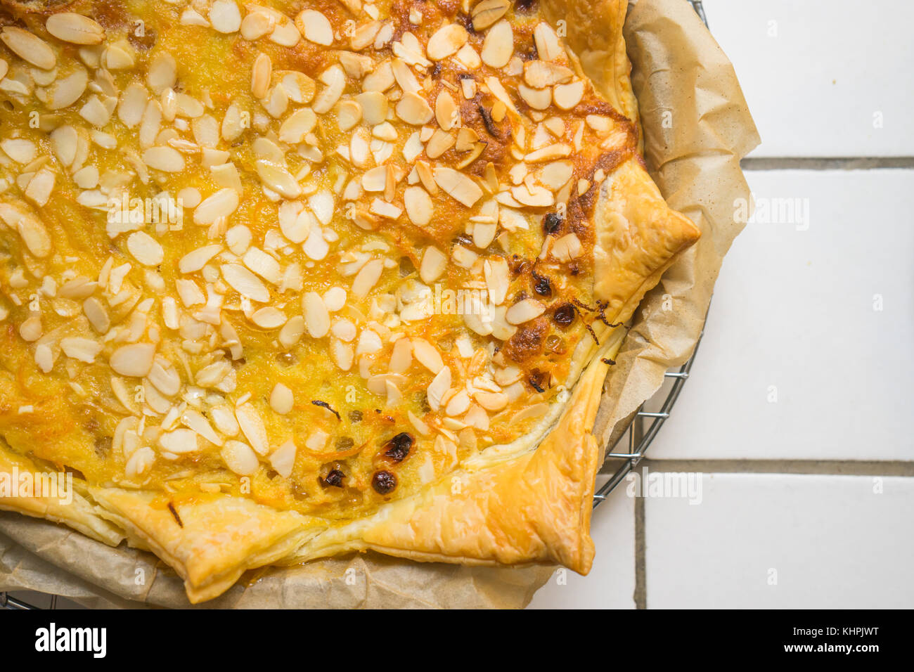 Queen Mary's Tart, traditional British pie on white tile background with copy space Stock Photo