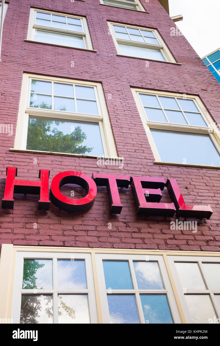 Hotel sign on the wall Stock Photo - Alamy