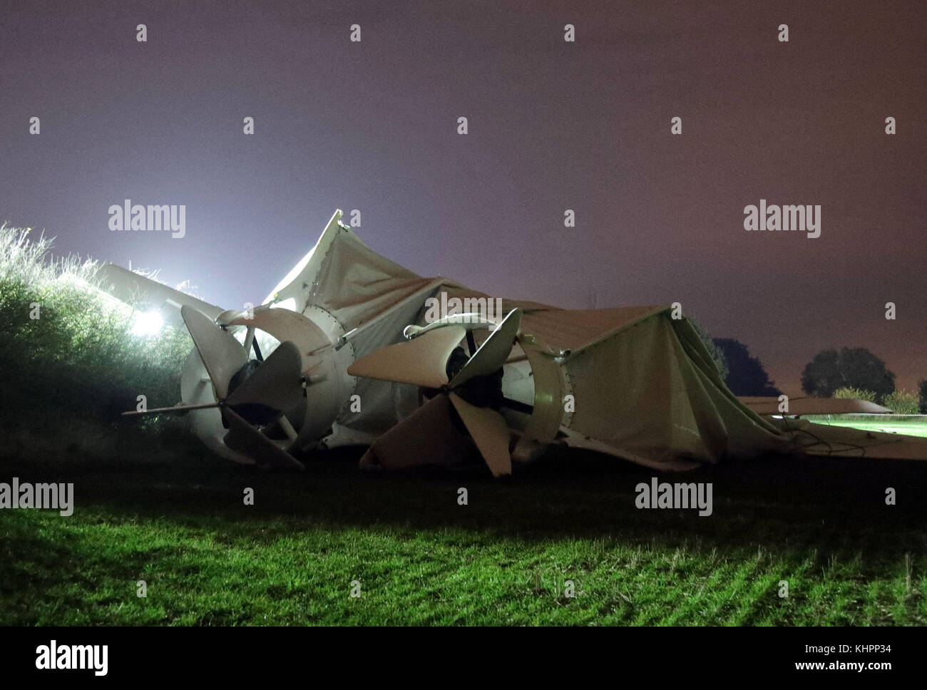 The remains of the Airlander 10, the world's largest aircraft, lies on the ground at Cardington airfield in Bedfordshire, as the aircraft, came loose from its moorings causing its hull to rip and deflate. Stock Photo