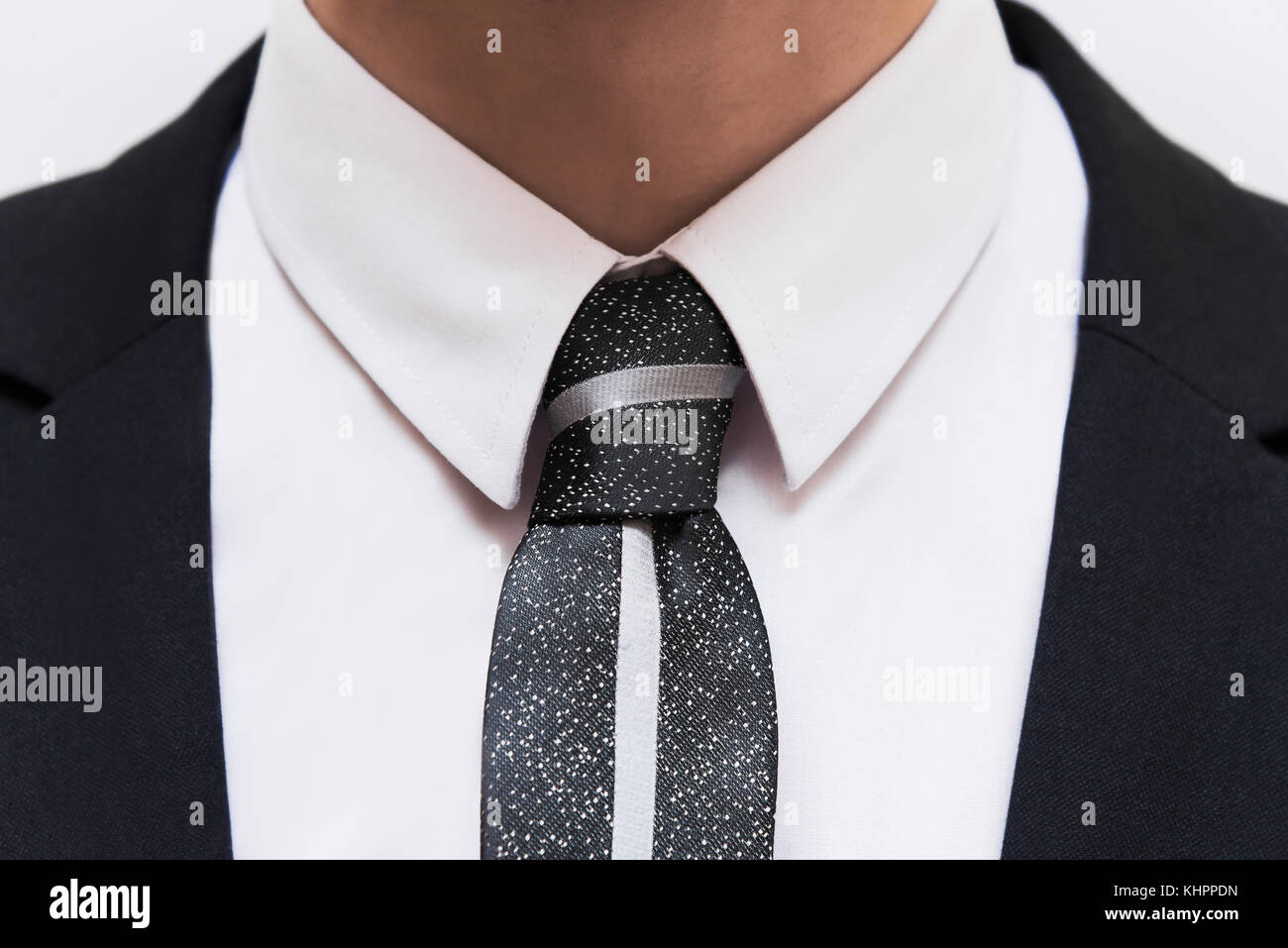 dark shirt with black suit