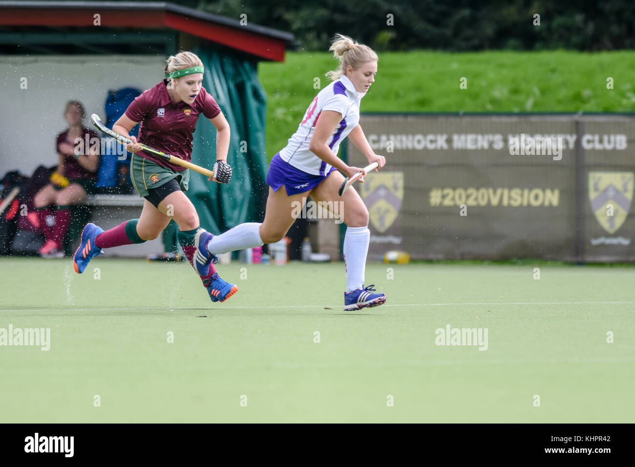 Two female field hockey players competing for the ball Stock Photo Alamy