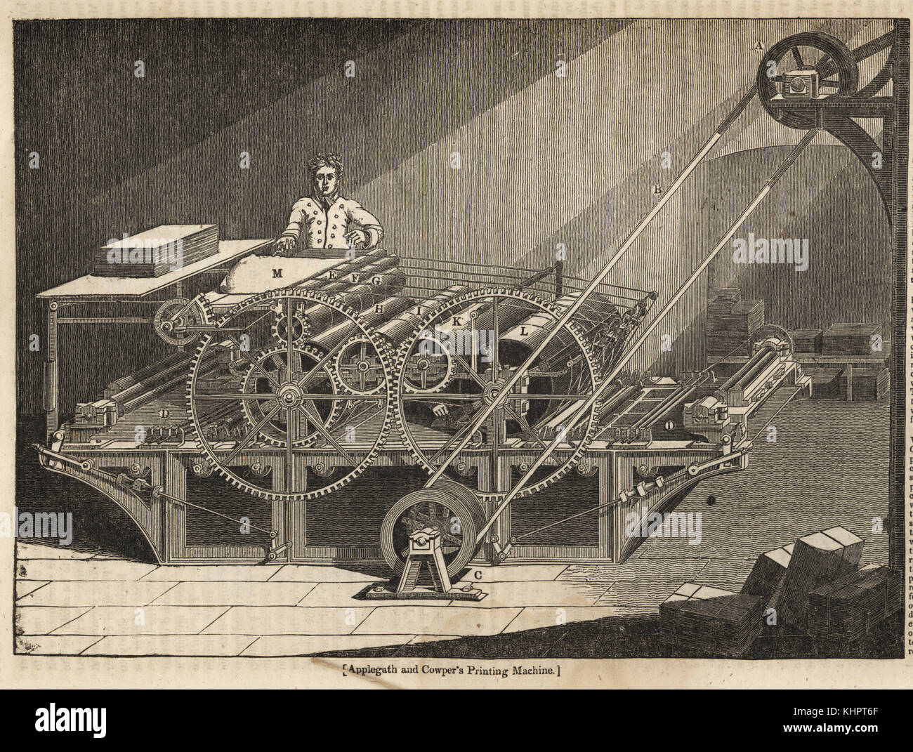 Augustus Applegath and Edward Cowper's printing machine. A boy inserts sheets of paper into the four-roller, 16-wheel printing machine capable of printing 5,000 sheets double-sided.  Woodblock engraving from the Penny Magazine,  Society for the Diffusion of Useful Knowledge, 1833. Stock Photo