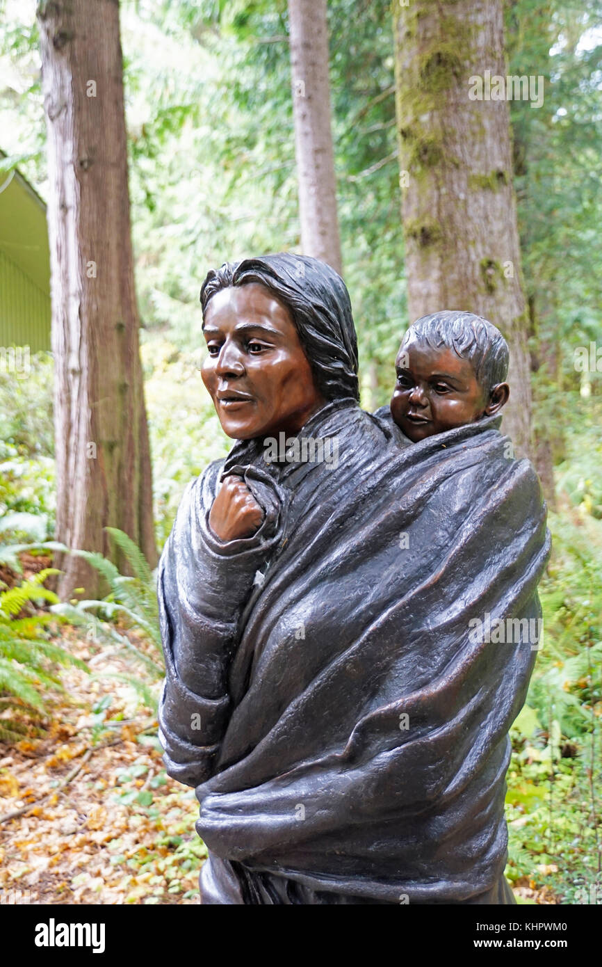 Statue of Sacajawea and her child, Jean Baptiste Charbonneau, at re-creation of Fort Clatsop at the Lewis and Clark National Historical Park near Asto Stock Photo