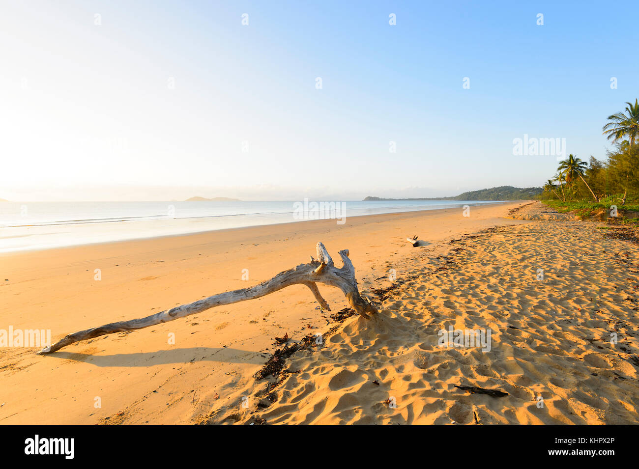 The sandy beach of South Mission Beach in the evening light, Coral Sea, Far North Queensland, FNQ, Australia Stock Photo