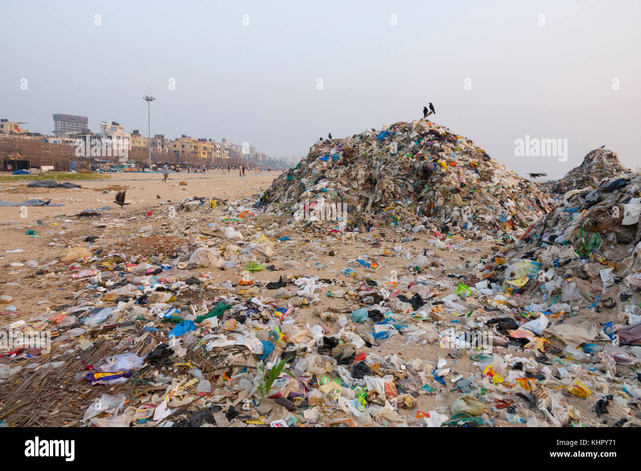 Huge piles of plastic garbage and other rubbish pollute Versova Beach, Mumbai, India Stock Photo