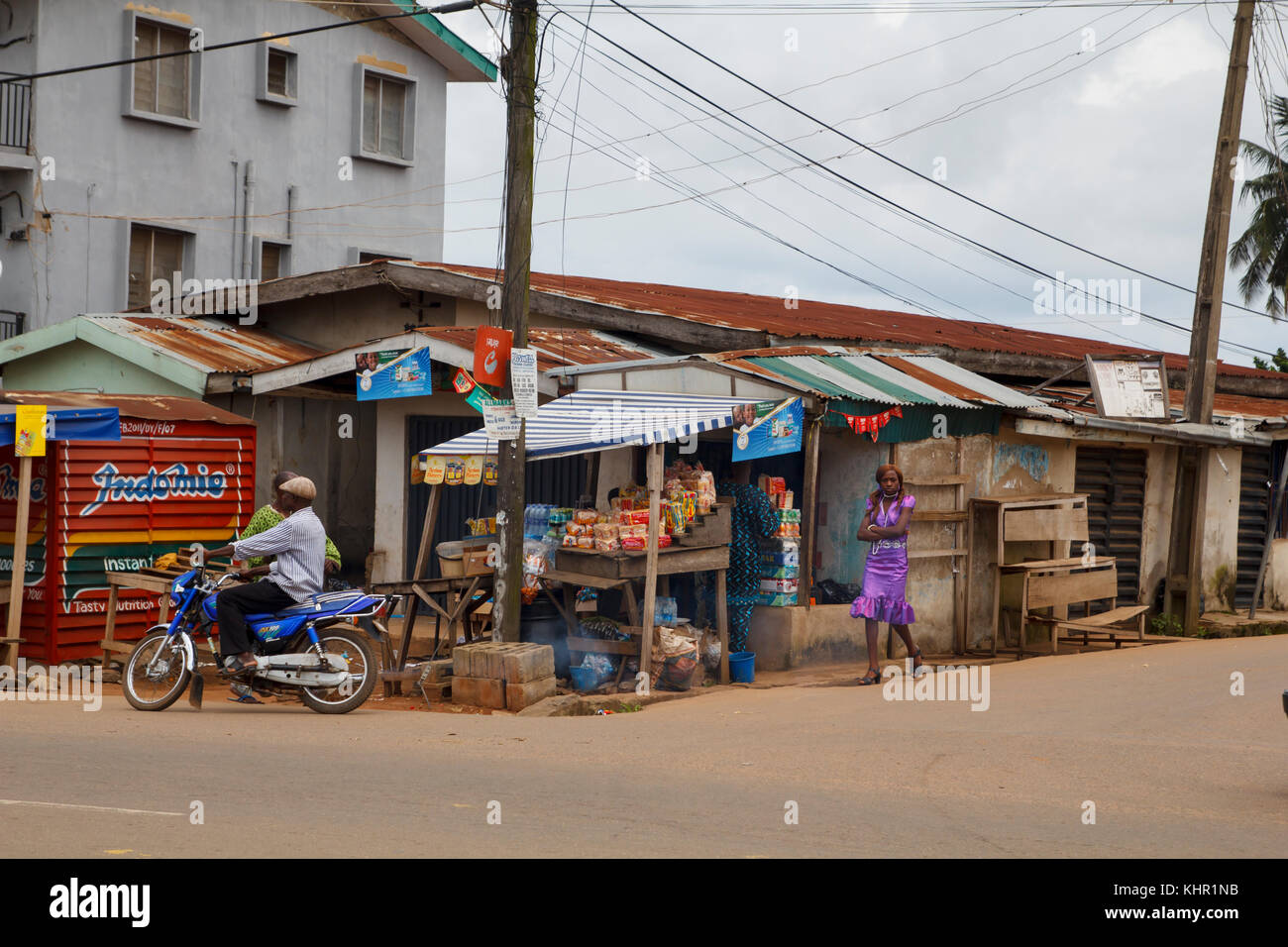 Nigerian men and woman in the street in the city of Akure in Ondo state, Nigeria Stock Photo