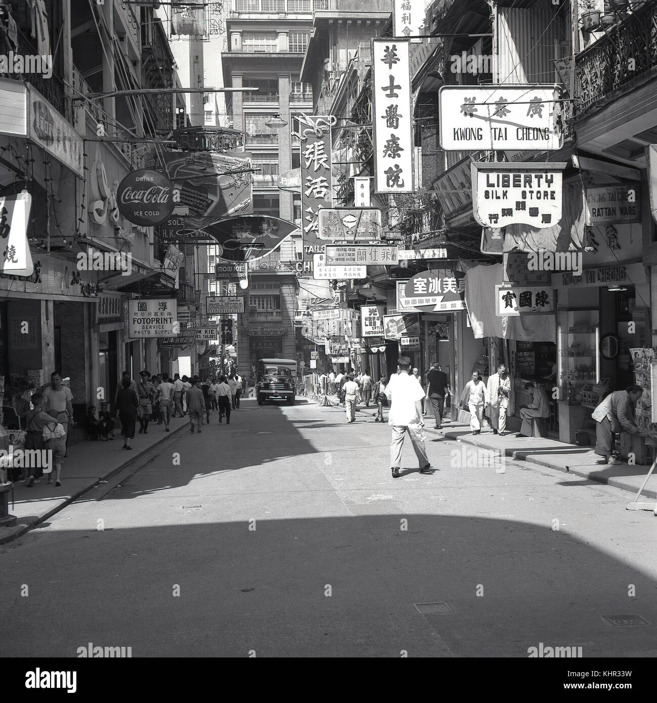 1950s, historical, daytime, summer and a view of a truck coming down a street in Hong Kong from this era by j Allan Cash. Stock Photo
