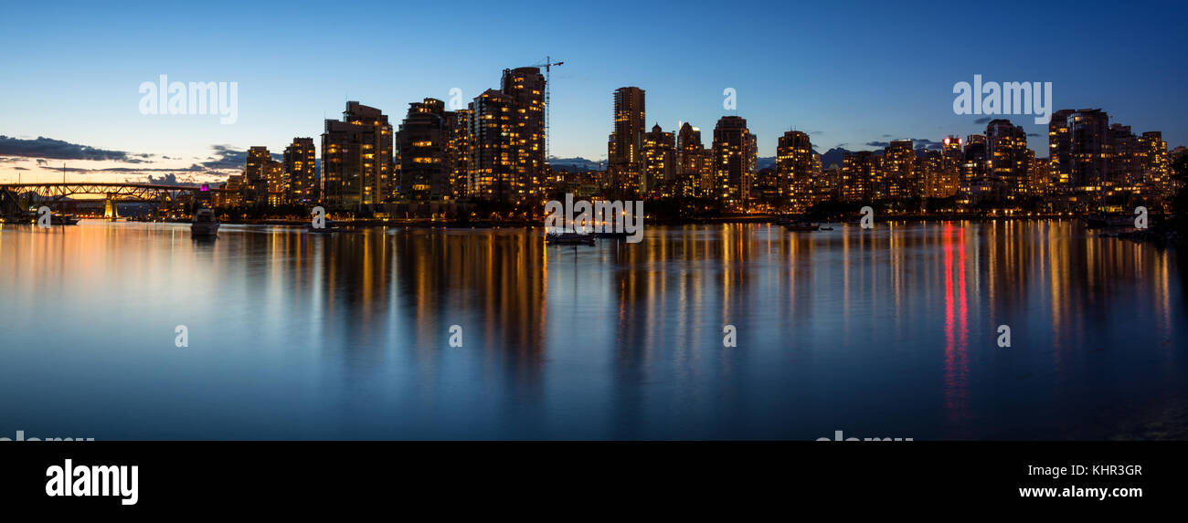 Vancouver Downtown Panoramic Skyline View after a beautiful sunset in ...
