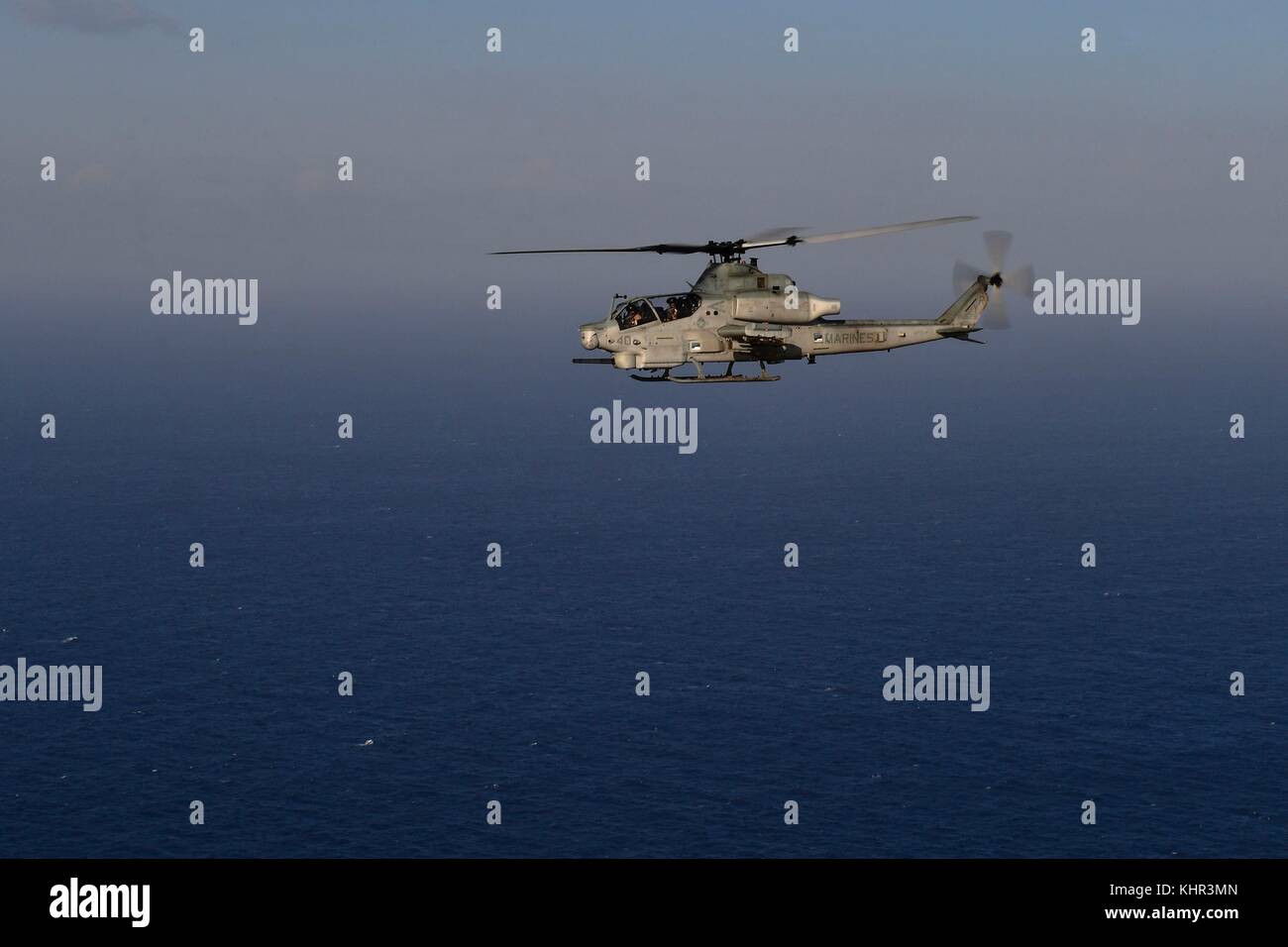 A U.S. Marine Corps AH-1Z Viper attack helicopter flies over the U.S. Navy San Antonio-class amphibious transport dock ship USS San Diego October 28, 2017 in the Mediterranean Sea.  (photo by Justin A. Schoenberger via Planetpix) Stock Photo