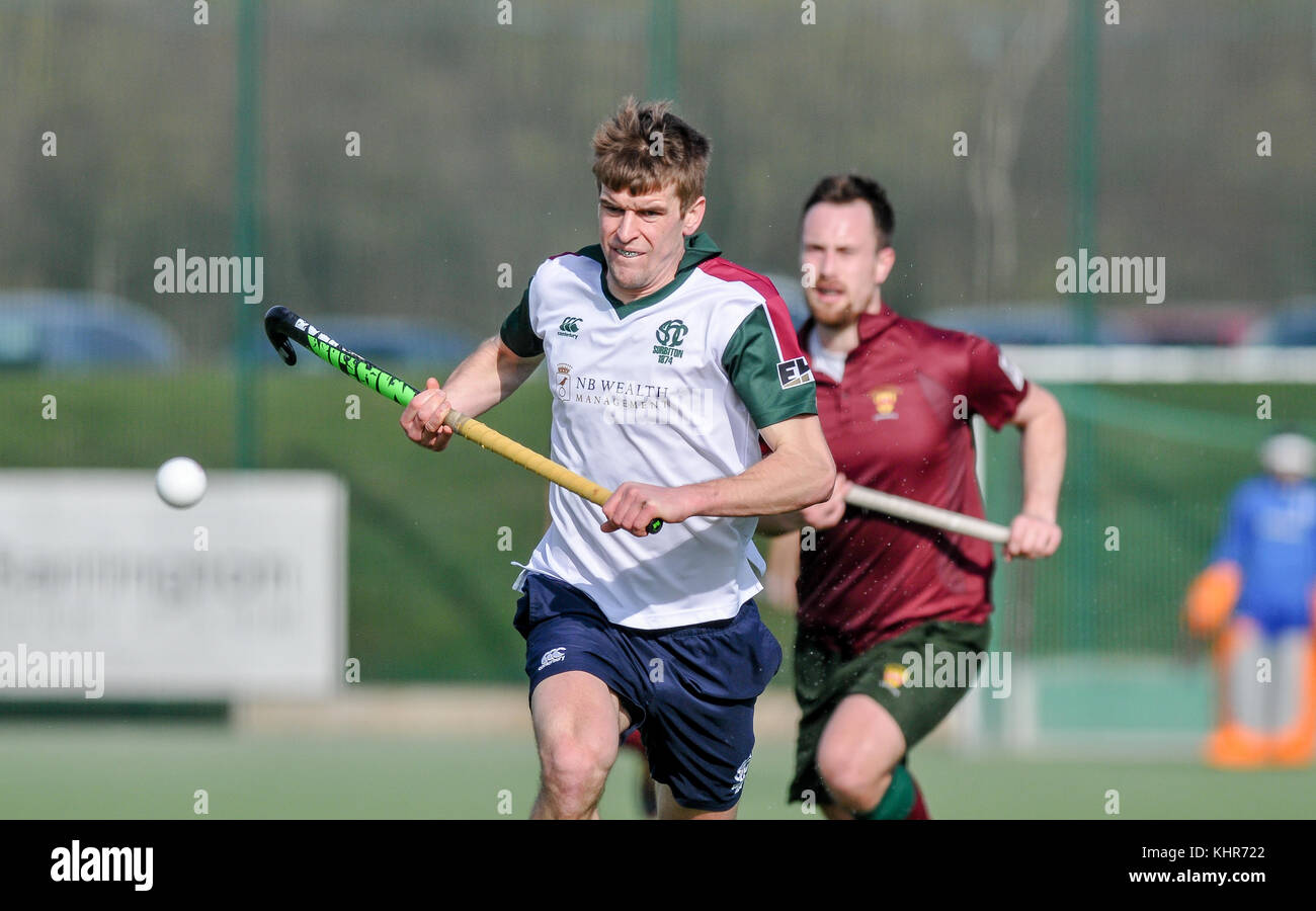 Two male field hockey players competing for the ball Stock Photo Alamy