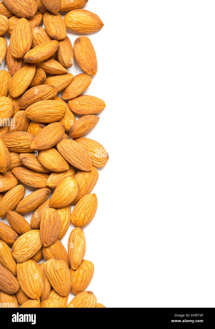 Shelled almond kernels border over white background Stock Photo Alamy