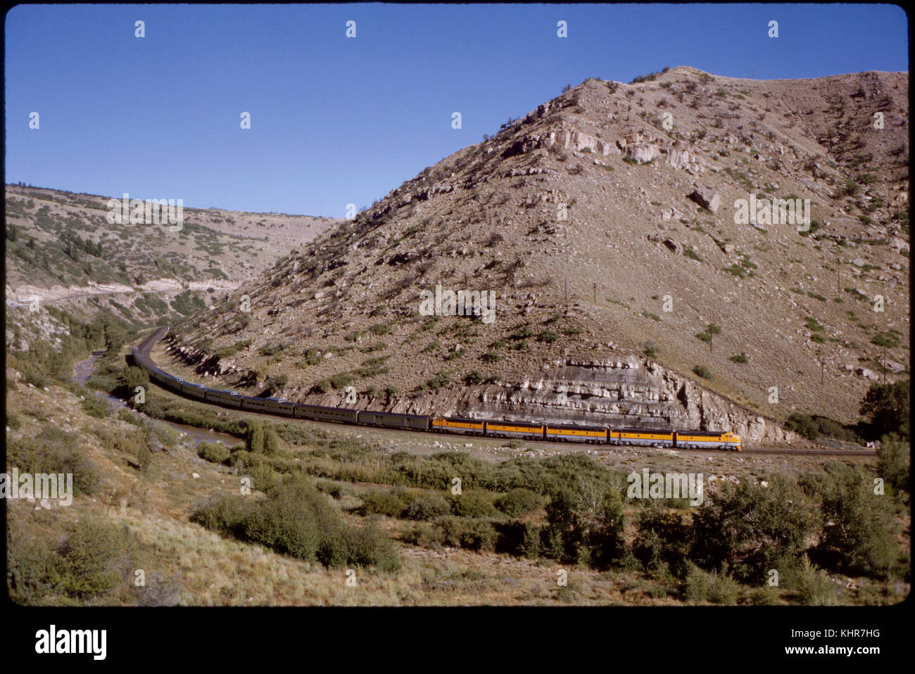 California Zephyr Train Curving Around Mountain, Utah, USA, 1965 Stock Photo