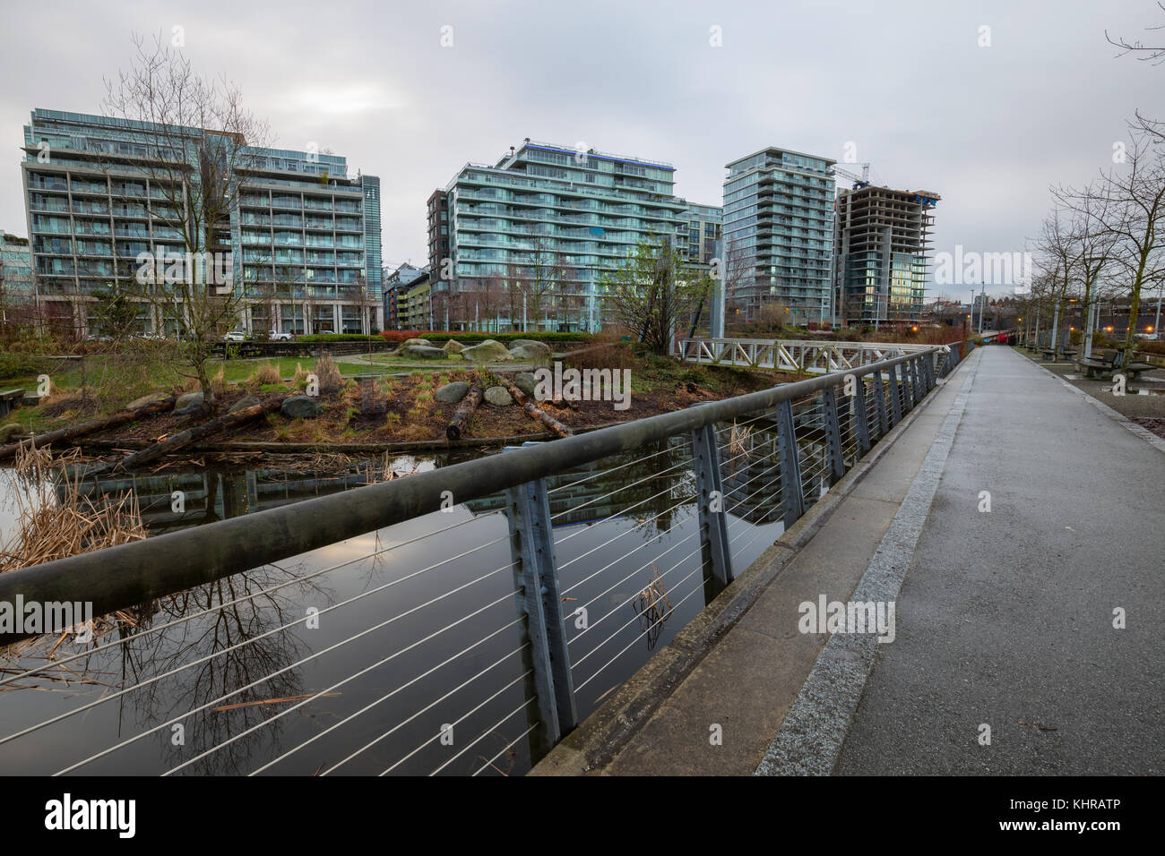 New apartment buildings around a beautiful park in False Creek