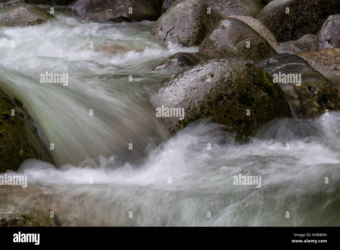 Flowing water around the soft rocks. Picture taken in Lynn Valley ...