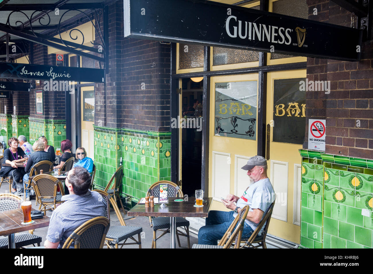 Guinness and James Squire beer signs at the Mercantile hotel pub in george street,Sydney,Australia Stock Photo