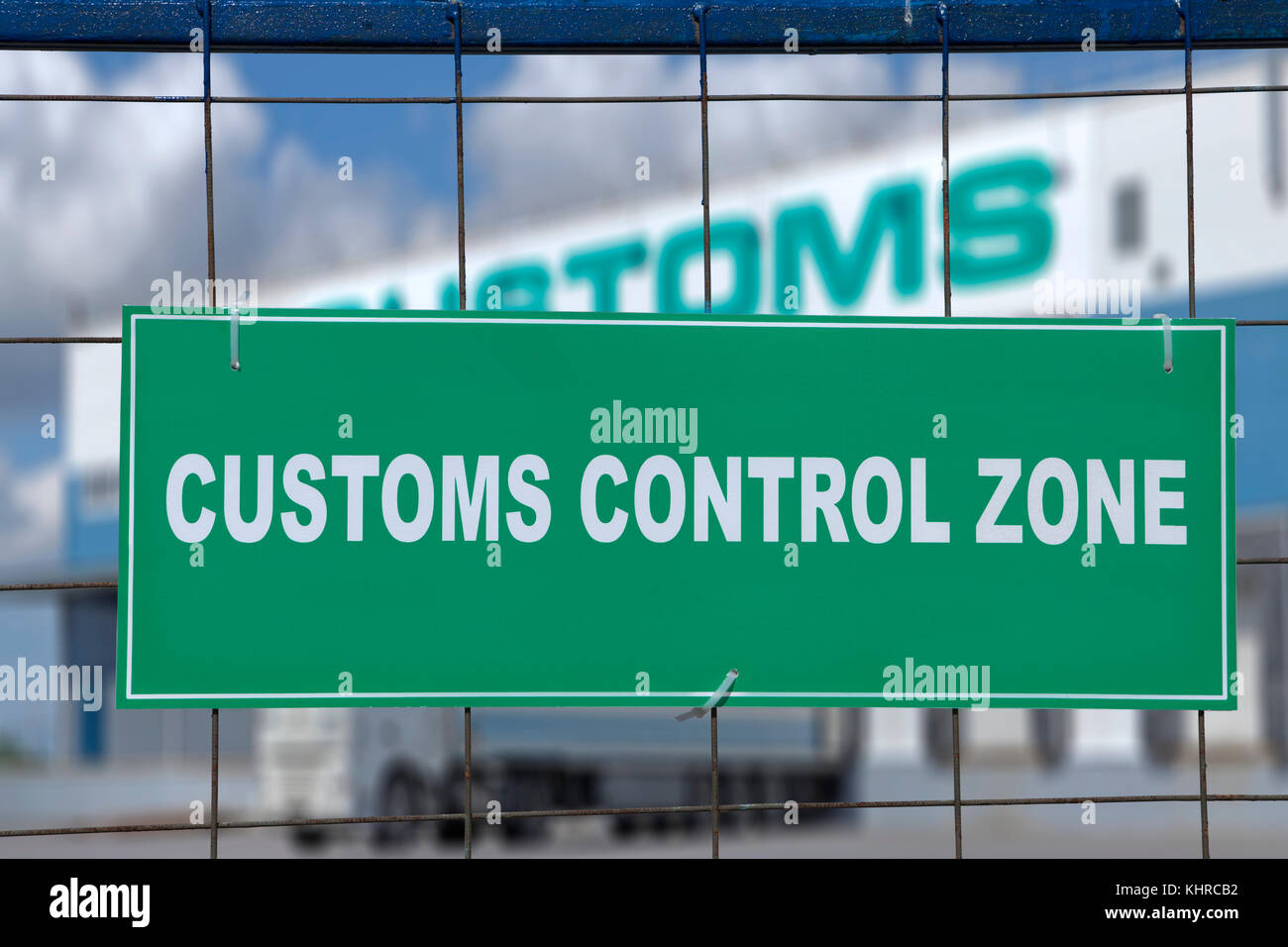 Logistics complex behind the green sign, customs control zone Stock