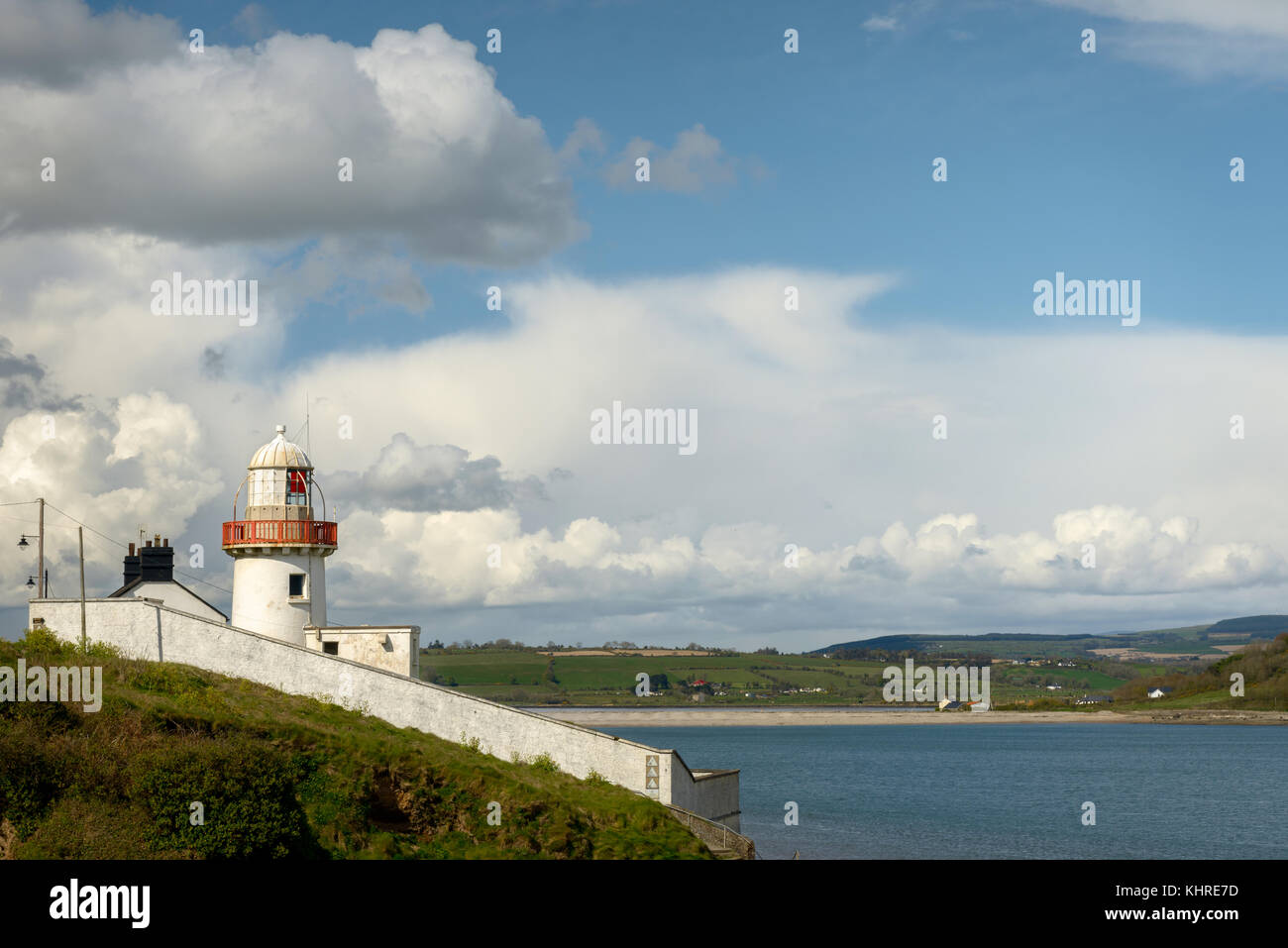 Lighthouses in Ireland and the Youghal lighthouse at the River Blackwater mouth on the Youghal bay on summer day in Youghal, County Cork, Ireland Stock Photo