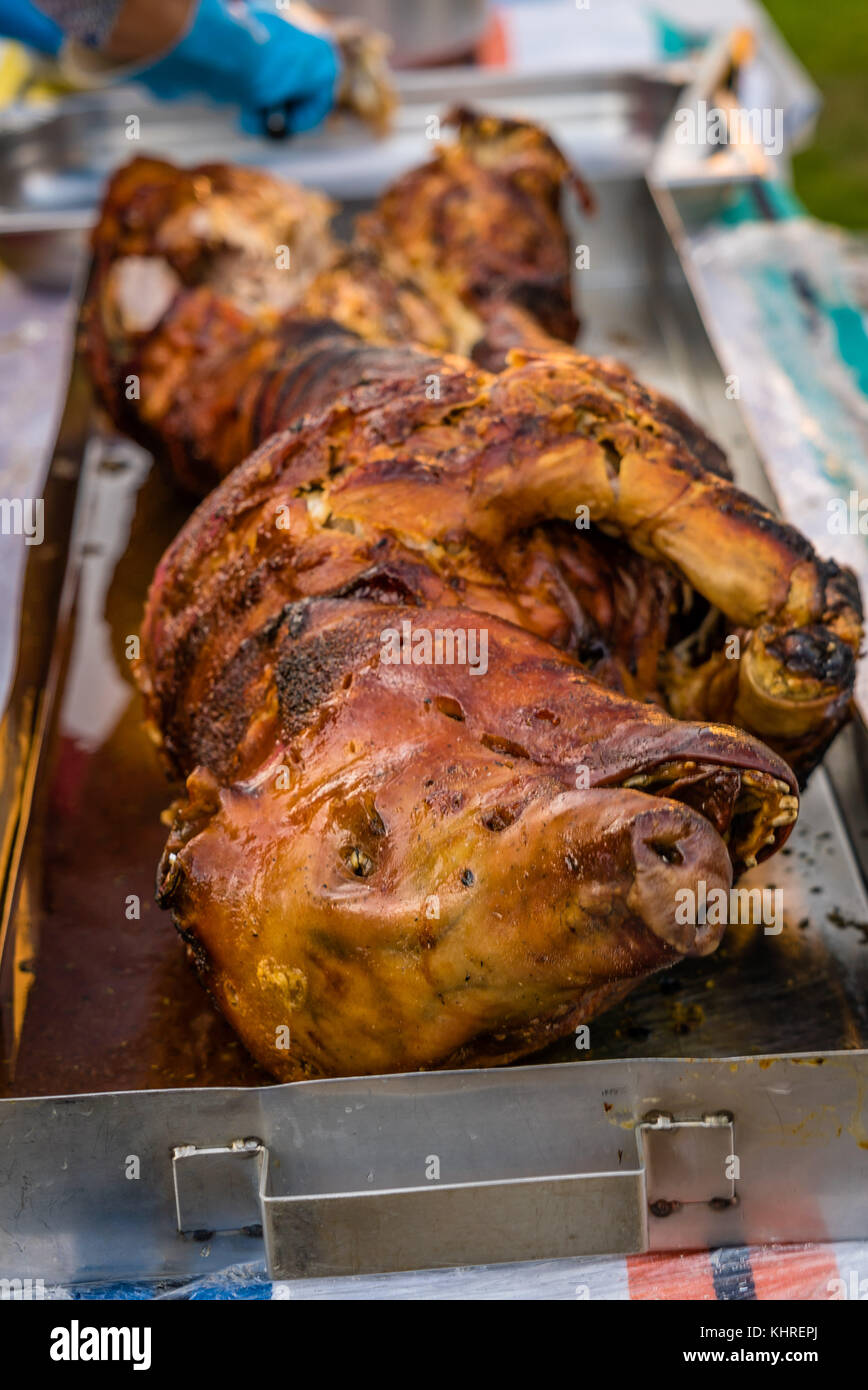 Whole pork roasted on the fire the french way Stock Photo Alamy