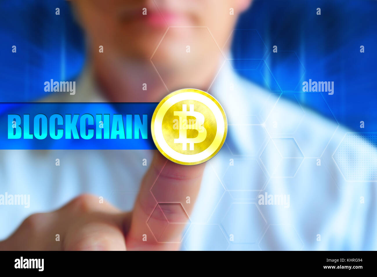 Bitcoin concept wallpaper, person at background, finger touch bitcoin sign. Blue background for blockchain news, financial themes Stock Photo