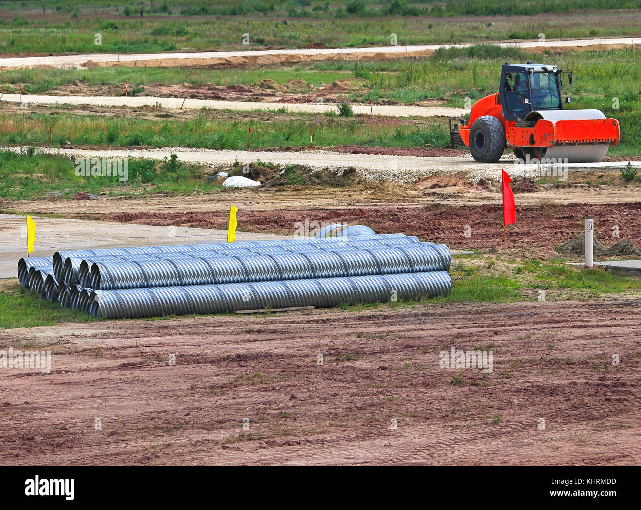 Corrugated aluminum rolls stacked at the site before construction Stock