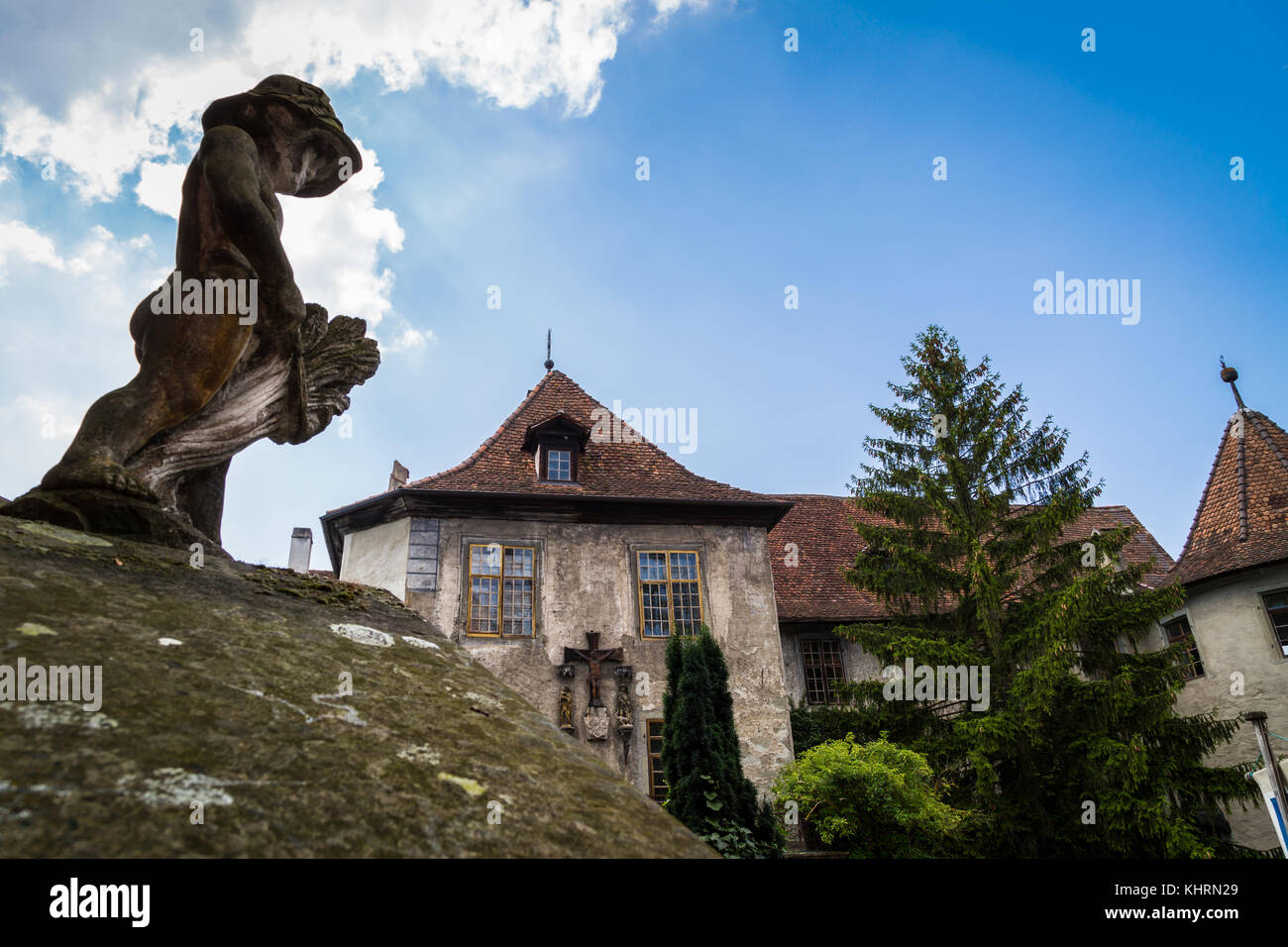 Castle in Meersburg, a small statue in the foreground. Stock Photo