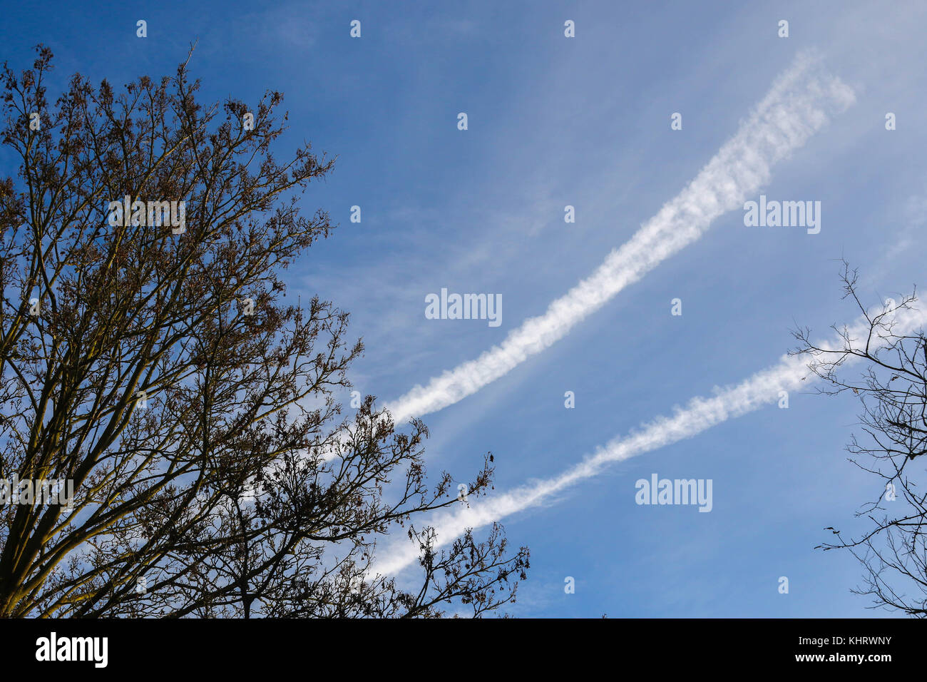 Expanding aircraft contrails. Great Abington, Cambridgeshire Stock Photo