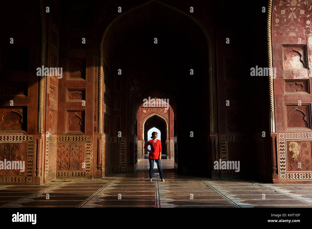 Woman in red shirt hi-res stock photography and images - Alamy