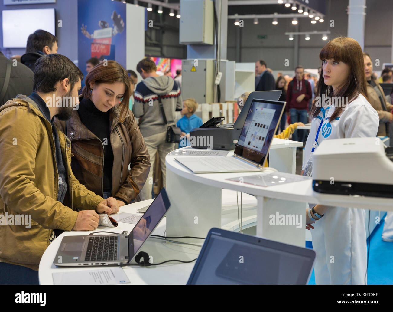 KIEV, UKRAINE - OCTOBER 07, 2017: People visit Hewlett-Packard, American multinational information technology company booth at CEE 2017, largest elect Stock Photo