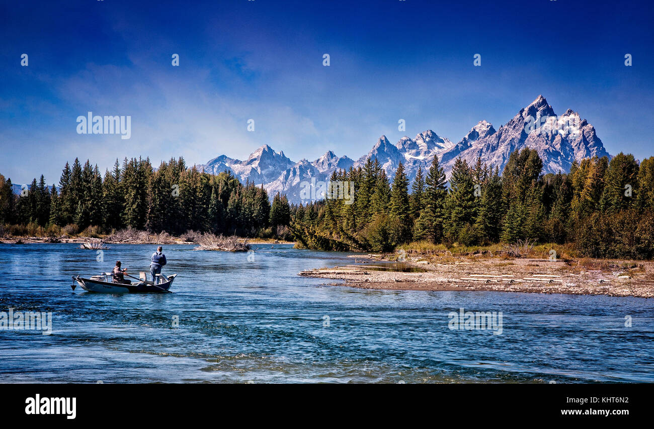Float fishing on the Snake River with the Grand Tetons in the background. Wyoming Stock Photo