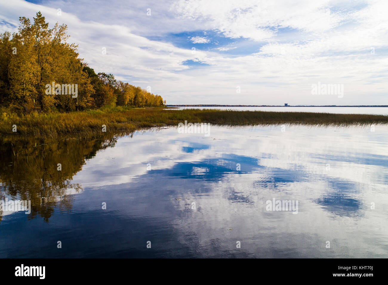 Sky reflexion in water in autumn Stock Photo
