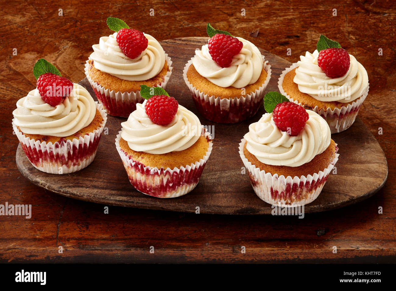Raspbery explosion cupcakes Stock Photo - Alamy